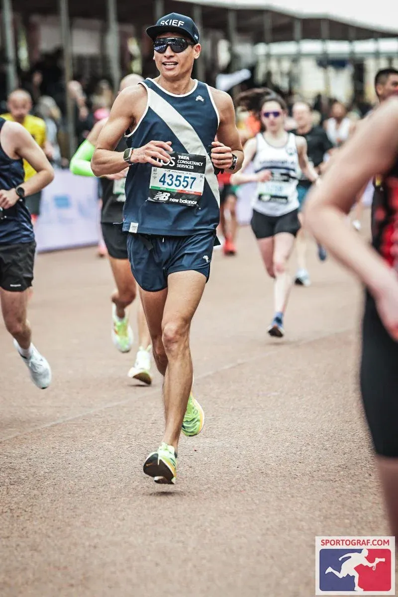 Sardar Azimov smiling near the finish of London Marathon 2024
